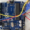 Arduino Uno wired on a workbench